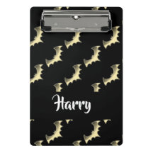 Bates de oro sobre negro