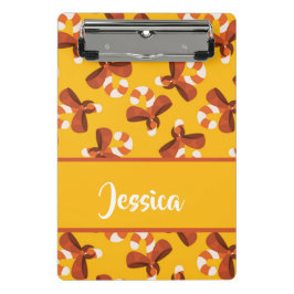 Minicarpeta De Pinza Candy cane wrapped with red bow pattern