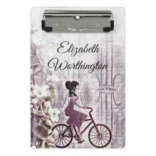 Minicarpeta De Pinza Dibujo de una joven en bicicleta