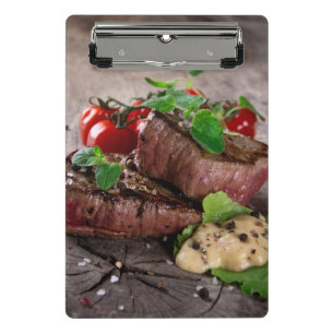 Minicarpeta De Pinza Filetes asados a la parrilla del Bbq con las