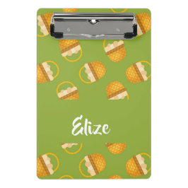 Minicarpeta De Pinza Huevos en cesta marrón en verde