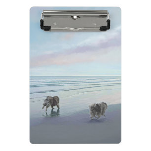 Minicarpeta De Pinza Manos en la pintura de perro en la costa