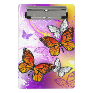 Minicarpeta De Pinza Mariposas monarcas en fondo morado