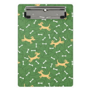 Minicarpeta De Pinza perros afortunados con el fondo de los huesos