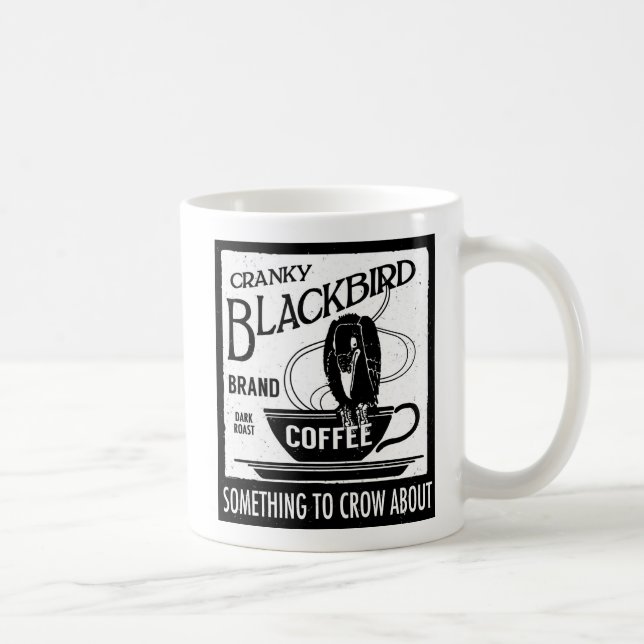 Mirlo de cuervo del negro de la taza de la (Derecha)