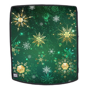 Mochila Copo de nieve dorado de Navidad sobre fondo verde