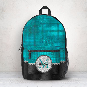 Mochila Impresa Chic monograma falso brillo plateado turquesa negr