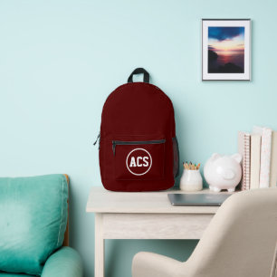 Mochila Impresa Colores y letras escolares en color granate y blan