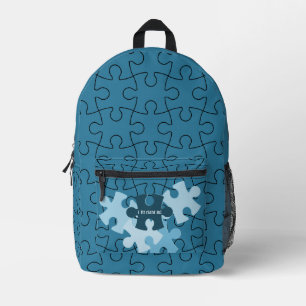 Mochila Impresa Divertidas piezas de rompecabezas en azul y lema