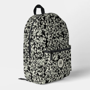 Mochila Impresa Fondo negro de flores blancas