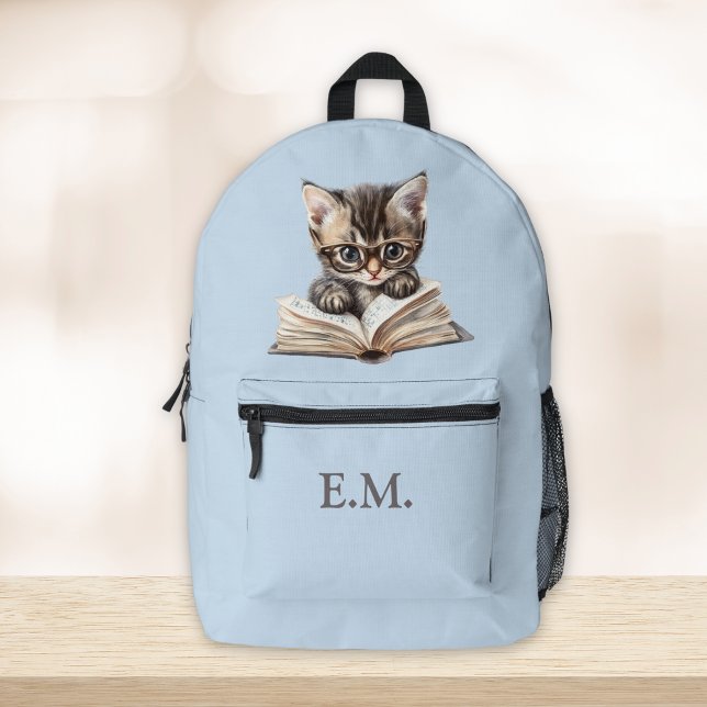 Mochila Impresa Gatito inteligente con gafas personalizado (Smart Kitten with Glasses Personalized Printed Backpack on a table.)