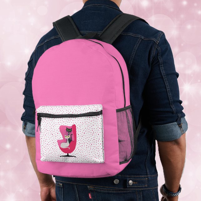Mochila Impresa Gatos atómicos en silla rosa brillante rosa con pu (Hot pink back pack with pink dots and two atomic cats in a pink chair on the front pocket.)