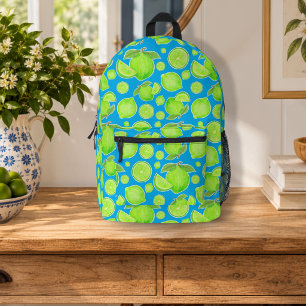Mochila Impresa Limas verdes sobre patrón de frutas cítricas azul