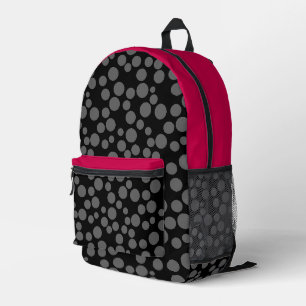 Mochila Impresa lunares rojos sobre fondo blanco