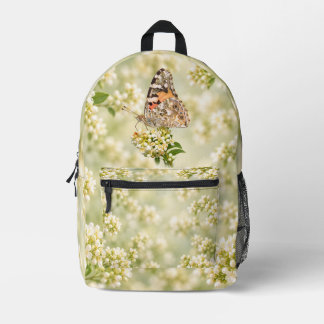 Mochila Impresa Mariposa Pintada sobre Flores Blancas