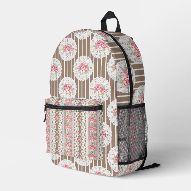 MOCHILA IMPRESA MARRONES DE LAZO BLANCO Y FLORES ROJOS (Esquina derecha trasera )