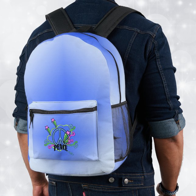 Mochila Impresa Mezcla de sombras de signo de paz azul desplaza es (Back pack in mixed shades of blue with abstract colourful peace design on front pocket.)