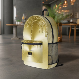 Mochila Impresa Monograma con brillo metálico dorado goteante
