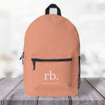 Mochila Impresa Monograma Coral Peach Elegante Femenino Minimalist<br><div class="desc">Un minimalista diseño de monograma con grandes iniciales tipográficas en una fuente clásica con su nombre debajo sobre un fondo femenino de melocotón de coral. ¡El regalo o accesorio perfectamente personalizado!</div>
