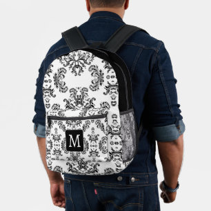 Mochila Impresa Monograma del patrón de damasco blanco y negro