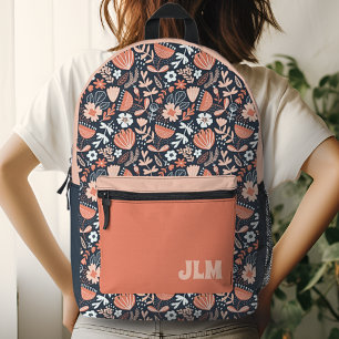 Mochila Impresa Monograma del patrón floral azul cúbano rosa y nav