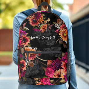 Mochila Impresa Monograma floral naranja fucsia atrevida