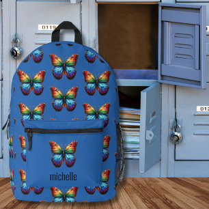 Mochila Impresa Monograma vibrante de mariposa arco iris