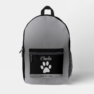 Mochila Impresa Paw de perro plateado sobre fondo negro