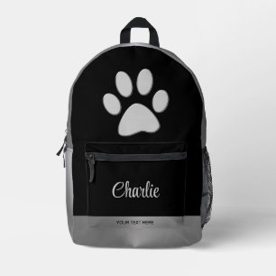 Mochila Impresa Paw de perro plateado sobre fondo negro