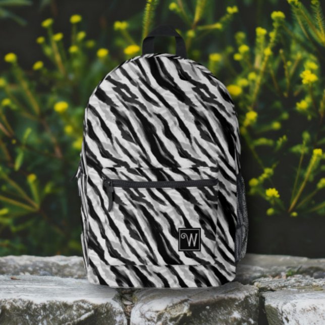 Mochila Impresa Resumen Piel de cebra animal Monograma blanco negr (An abstract design inspired zebra skin in a black and white monogram backpack for wherever you go.)