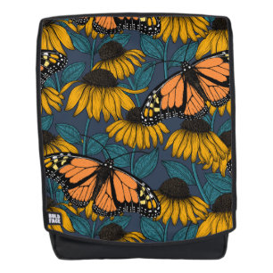 Mochila Mariposa monarca sobre las colmenas amarillas