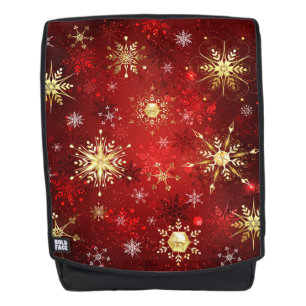 Mochila Navidades Copos de nieve dorados con fondo rojo