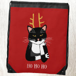 Mochila Navidades sarcásticos Gato Kitty<br><div class="desc">Un gracioso sarcástico,  fastidiado y poco entusiasta gato de esmoquin blanco y negro con Navidades que ríe. Ho ho ho,  y todas esas cosas. Cambie o quite el texto al personalizar.</div>