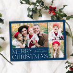 Moderna Feliz Navidad 4 Collage de fotos<br><div class="desc">Tarjeta navideña simple y elegante con un collage de fotos en la parte delantera con "Feliz Navidad" colgado en letras blancas y modernas sobre un fondo azul marino. Personalice la parte delantera de la tarjeta agregando sus fotos y su nombre. La tarjeta se invierte para mostrar la cuarta foto con...</div>