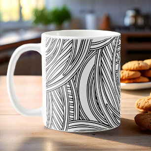 Moderna taza de café en blanco y negro con remolin