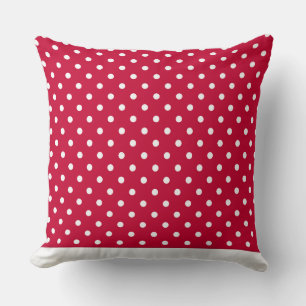 Moderno almohada de punto rojo con puntos blancos 