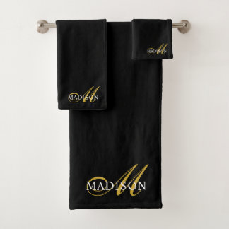 Moderno y elegante guión de monograma de oro negro