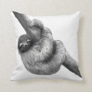 Mofeta y almohada reversibles de la pereza