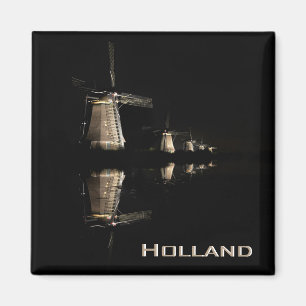 Molinoes de viento iluminados en el imán del text