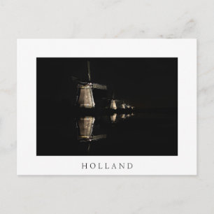 Molinos de viento iluminados en postales blancos h