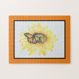 Monarca del rompecabezas sobre el girasol