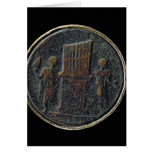 Moneda romana que representa un órgano (Frente)