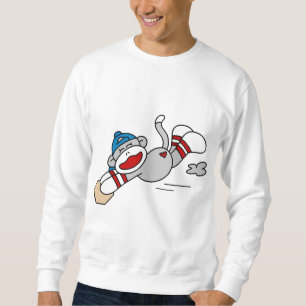 Monkey el salto del béisbol en las camisetas y lo
