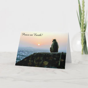 Mono de la Paz en la Tierra con tarjeta de vacacio