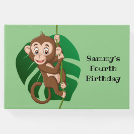 Mono en un libro de invitados de diseño de vino