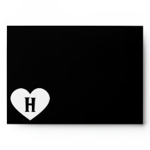 Monograma blanco grande del corazón y fondo negro