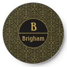 Monograma de filigrana negro y dorado