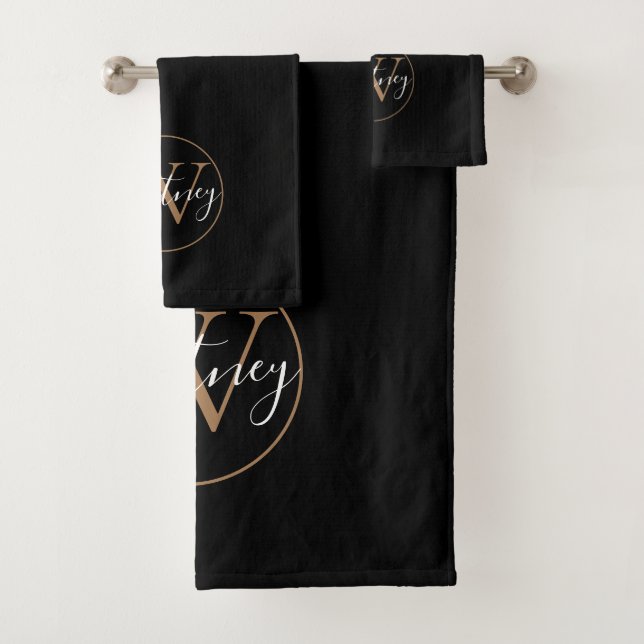 Monograma de letra script elegante negro y dorado (In situ)