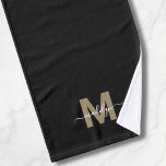 Monograma de nombre con letra cursiva en negro ele<br><div class="desc">Toalla de mano personalizada con monograma elegante en negro y dorado. Agrega un toque de simplicidad elegante a tu baño con esta toalla de mano con monograma glamorosa, diseñada con un estilo de tres dobleces para un aspecto cuidado y refinado. Con una inicial dorada en negrita (nota: el dorado es...</div>