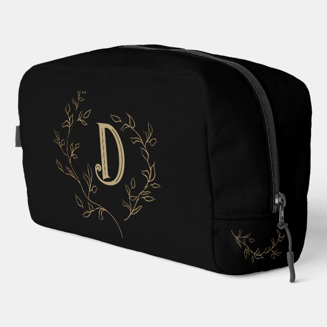 Monograma de oro clásico sobre bolsa de viaje negr (Esquina derecha)